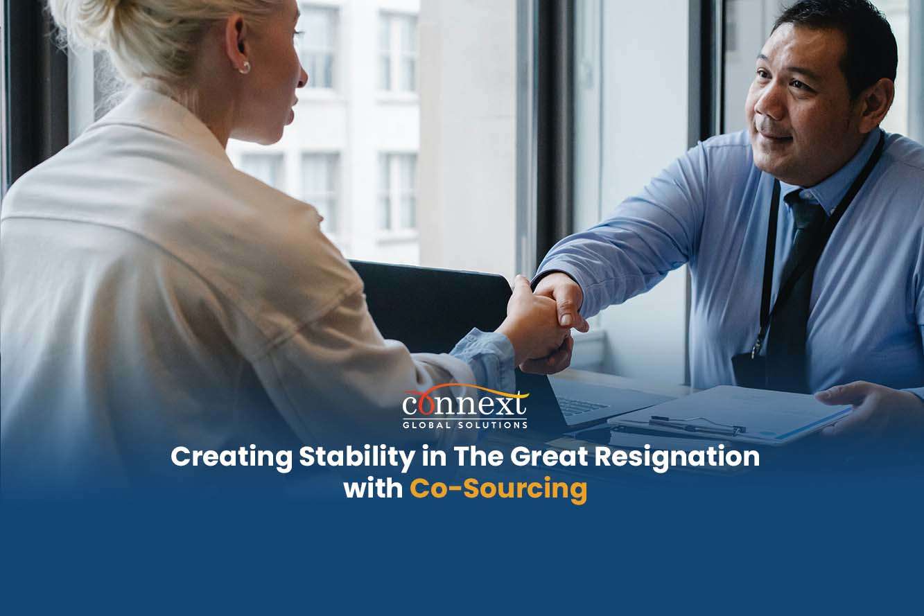 Creating Stability in The Great Resignation with Co-Sourcing corporate handshake