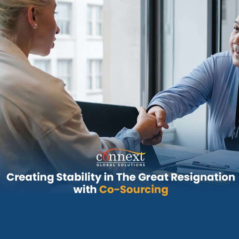 Creating Stability in The Great Resignation with Co-Sourcing corporate handshake