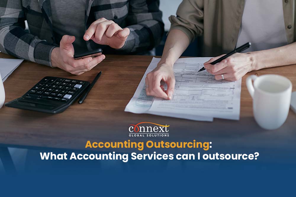 Accounting Industry Outlook and the Relevance of Accounting Outsourcing man holding a calculator woman writing on invoice