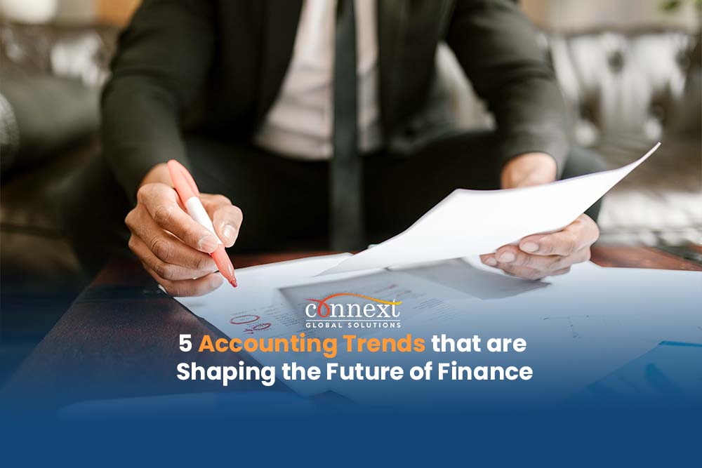 5-Accounting-Trends-that-are-Shaping-the-Future-of-Finance-man-with-financial-documents