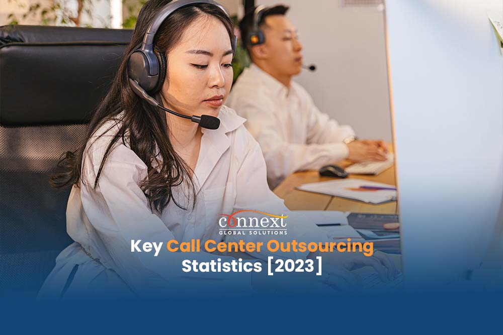 Key-Call-Center-Outsourcing-Statistics-2023-asian-woman-and-man-in-office-attire-with-headset-in-a-call-center-office-1@1x_1