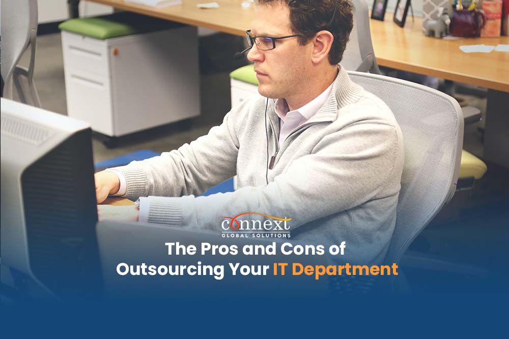 The-Pros-and-Cons-of-Outsourcing-Your-IT-Department-man-in-corporate-attire-with-computer-in-office-1@1x_1