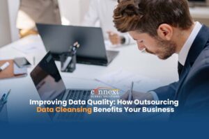 Improving-Data-Quality-How-Outsourcing-Data-Cleansing-Benefits-Your-Business-caucasian-man-in-corporate-suit-attire-using-laptop-in-office