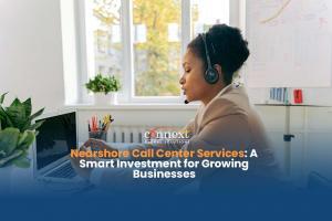 Nearshore-Call-Center-Services-A-Smart-Investment-for-Growing-Businesses-woman-using-laptop-and-headset-in-corporate-attire-inside-office