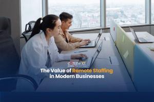 The-value-of-remote-staffing-in-modern-businesses-asian-man-and-woman-sitting-at-desk-with-laptops-in-office