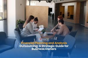 Financial-Planning-and-Analysis-Outsourcing-A-Strategic-Guide-for-Business-Owners-team-in-corporate-attire-in-a-meeting-at-the-office