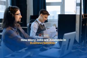 How-Many-Jobs-are-Available-in-Business-Services-men-in-corporate-attire-wearing-headset-with-papers-laptop-and-computer-in-office