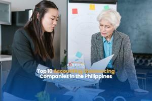 Top-10-Accounting-Outsourcing-Companies-in-the-Philippines-asian-office-staff-in-corporate-attire-in-a-meeting-holding-paperworks-in-office