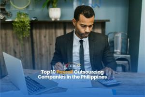 Top-10-Payroll-Outsourcing-Companies-in-the-Philippines-man-in-corporate-attire-suit-and-necktie-with-laptop-and-calculator-working-in-office
