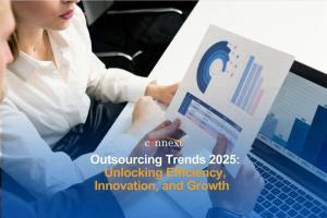 Outsourcing Trends 2025: Unlocking Efficiency, Innovation, and Growth woman with a graph and laptop in office