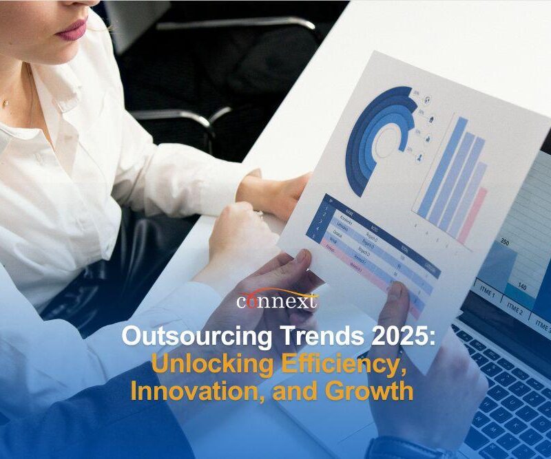 Outsourcing Trends 2025: Unlocking Efficiency, Innovation, and Growth woman with a graph and laptop in office