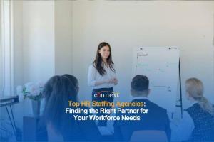 Top HR Staffing Agencies: Finding the Right Partner for Your Workforce Needs woman standing in a presentation conference full of people