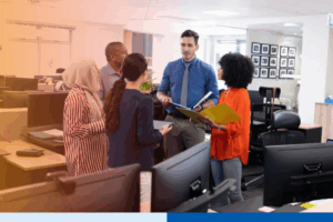 diverse-group-of-professionals-in-a-team-huddle-in-office