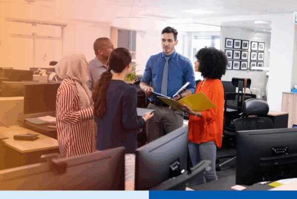 diverse-group-of-professionals-in-a-team-huddle-in-office