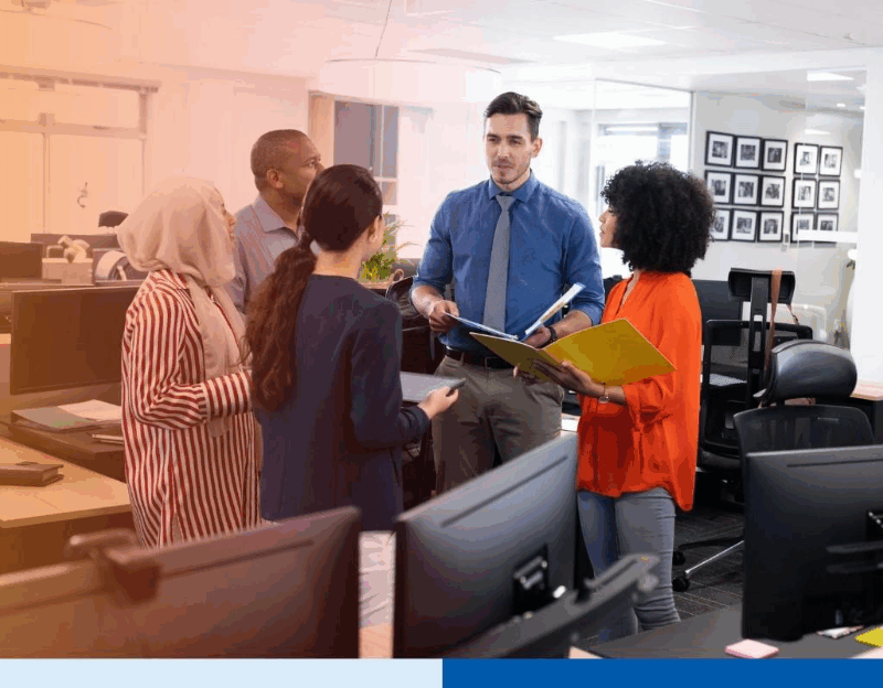 diverse-group-of-professionals-in-a-team-huddle-in-office