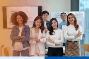 Young-businessman-and-a-beautiful-asian-businesswomen-arms-crossed