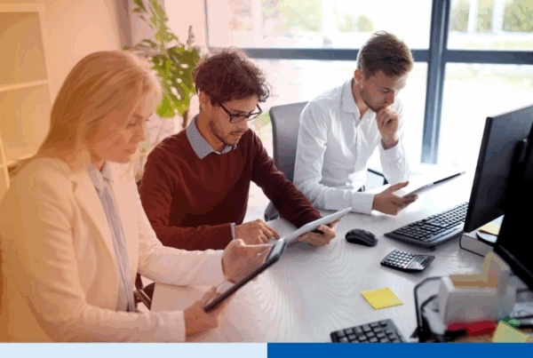 group-of-corporate-professionals-using-tablets-in-office