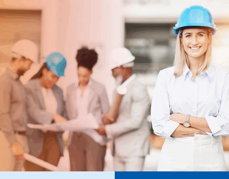 woman surveyor in hard hat in a construction site
