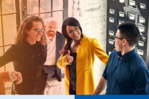 Beautiful business people are using gadgets, talking and smiling during the conference in office