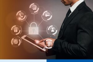 businessman using digital tablet on dark background with internet