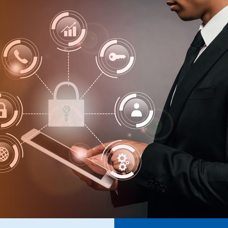 businessman using digital tablet on dark background with internet