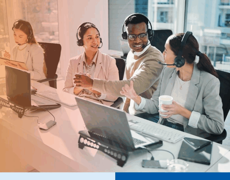 Call center, staff group and talk at help desk with laptop, telemarketing or voip tech with problem