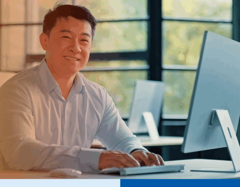 Mature-asian-businessman-chinese-korean-japanese-office-working-using-desktop 