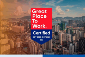 Great Place to Work Certified badge for Connext, valid from October 2025 to October 2026, displayed over a city skyline background