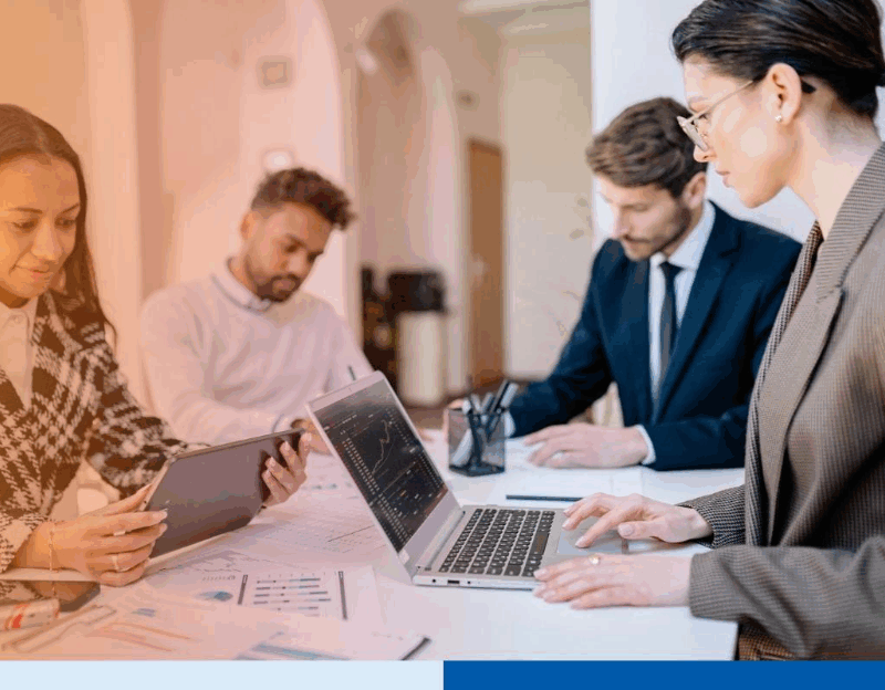 Offshore staff augmentation team in corporate attire working at Connext Global office office