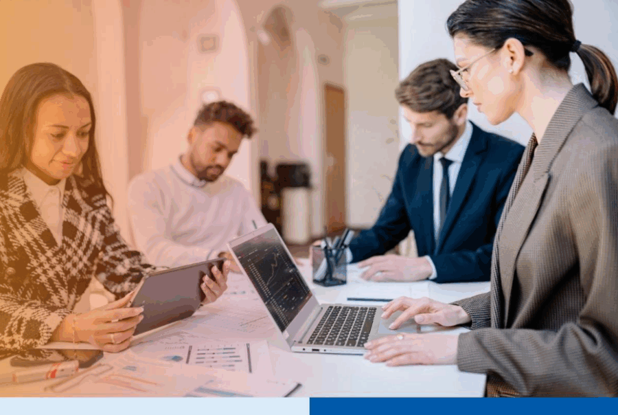 Offshore staff augmentation team in corporate attire working at Connext Global office office