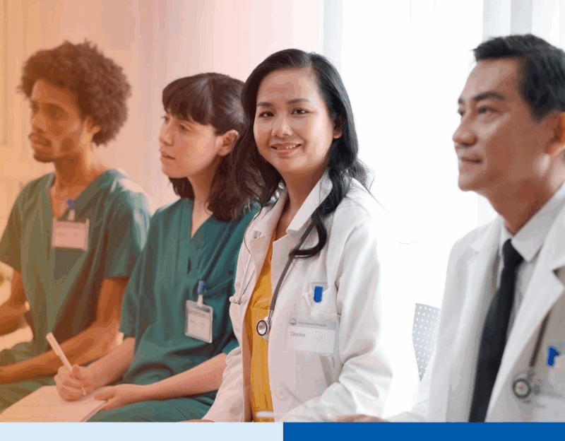 Doctor in white coat Visiting Conference 