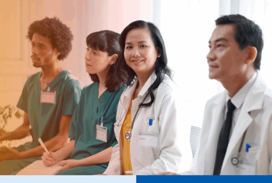 Doctor in white coat Visiting ConferenceÂ