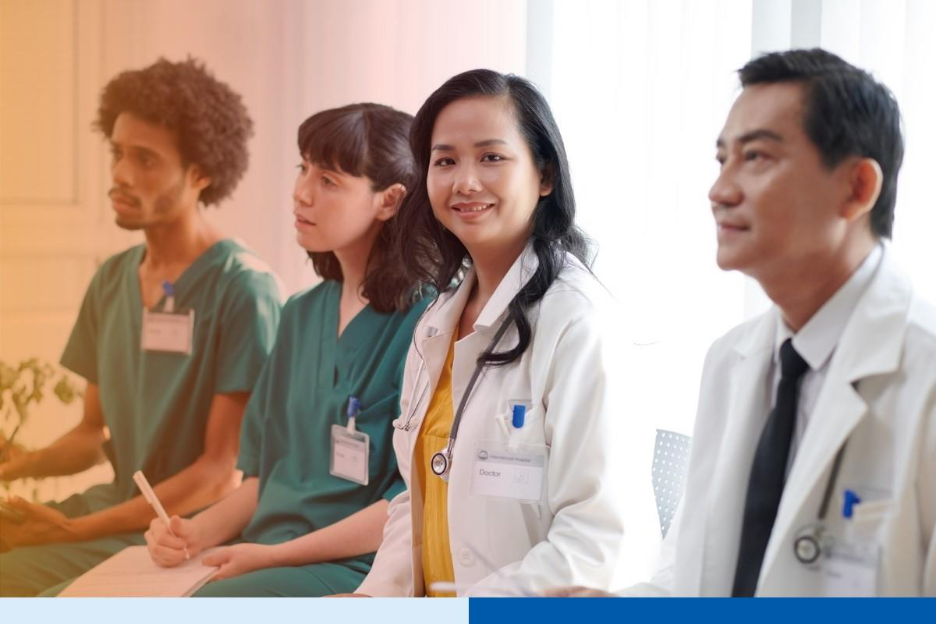 Doctor in white coat Visiting Conference 