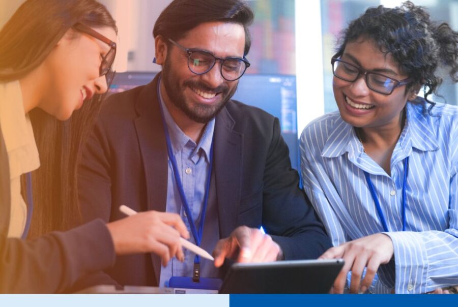 An Indian tech leader teaching a diverse team of IT professionals