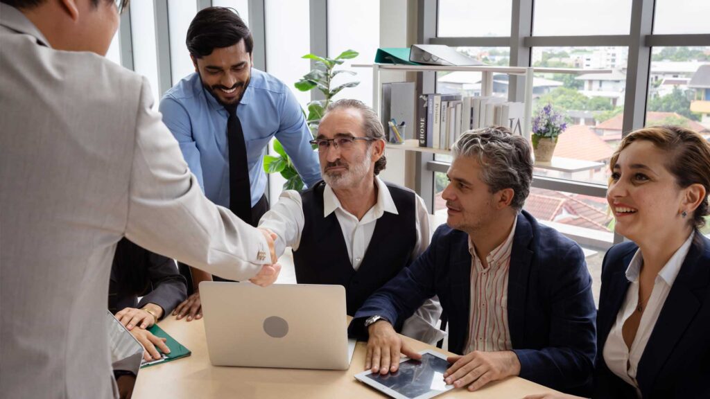 A group of IT professionals in Colombia collaborating together for a software project.  