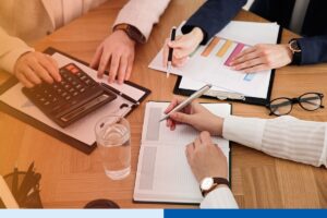 A group of accountants in India doing tax preparation for an outsourcing service