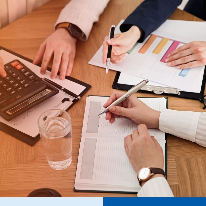 A group of accountants in India doing tax preparation for an outsourcing service