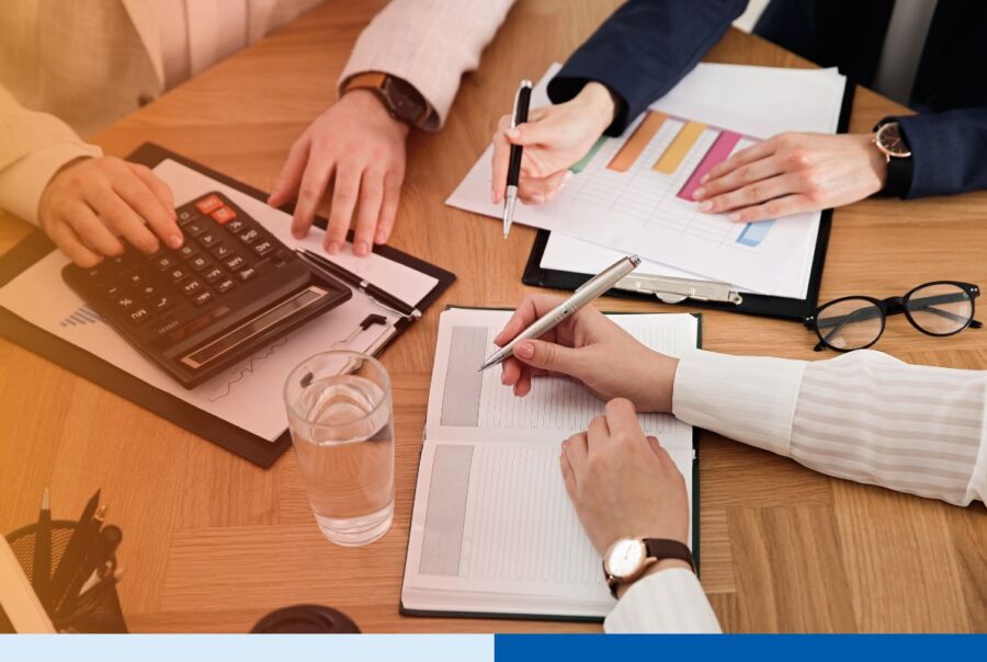 A group of accountants in India doing tax preparation for an outsourcing service