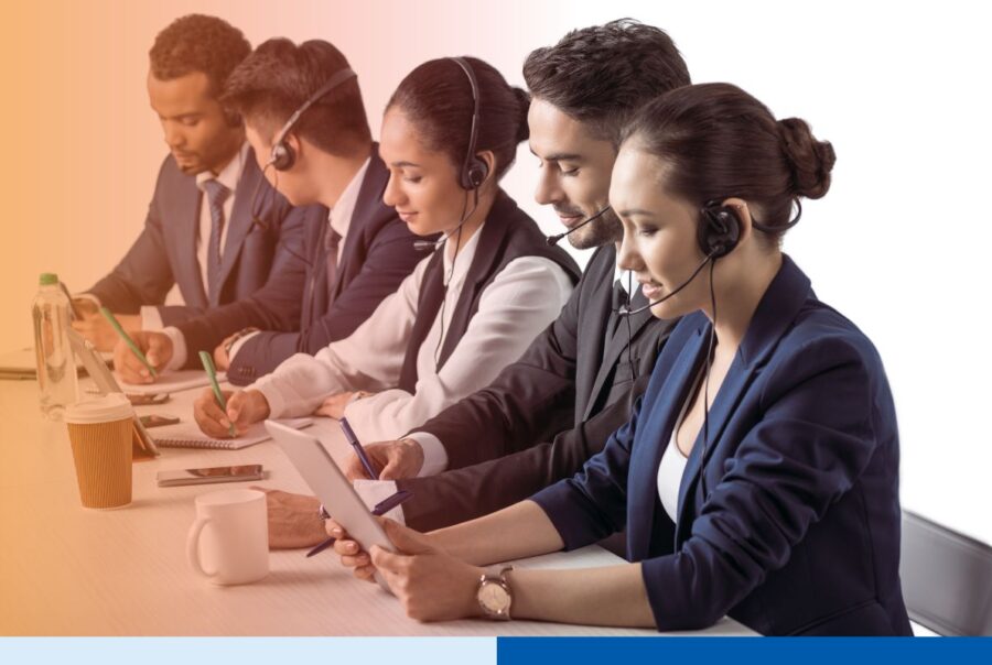 A group of dedicated Colombian offshore team working together for an outsourcing project.