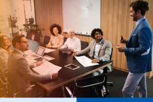 Offshore L&D manager delivering a structured onboarding program to a distributed team through a managed training process outsourcing model