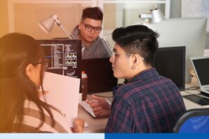 A group of software developers from Philippines working together for an outsourcing project.