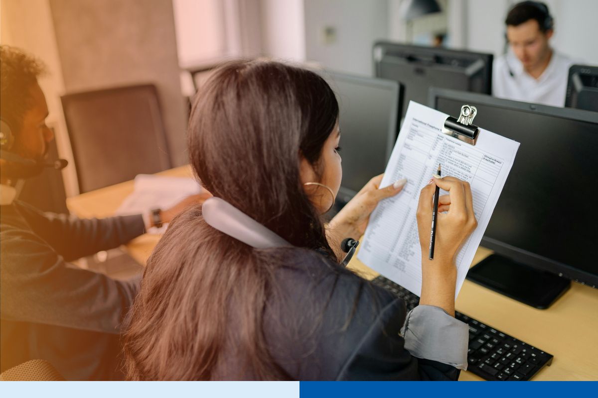 Offshore RCM specialists reviewing AI-generated insurance eligibility verification data