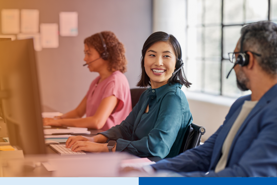 Outsourced accounting team collaborating in an office, the kind of dedicated staff a Hawaii business evaluates when choosing a provider