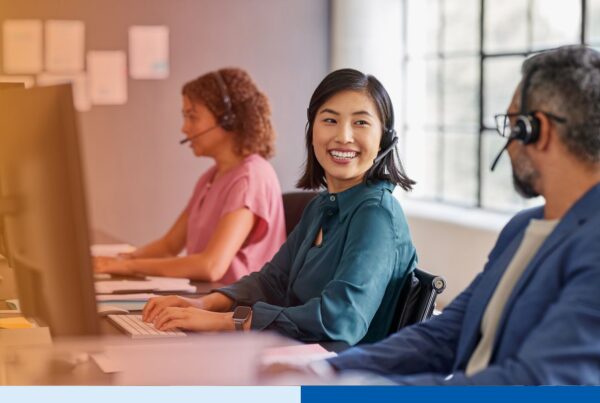 Outsourced accounting team collaborating in an office, the kind of dedicated staff a Hawaii business evaluates when choosing a provider