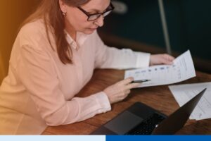 RCM director reviewing a multi-state patient collections compliance standard