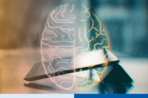 Close-up of a tablet displaying a glowing circuit-pattern brain graphic, representing digital IP and data protection