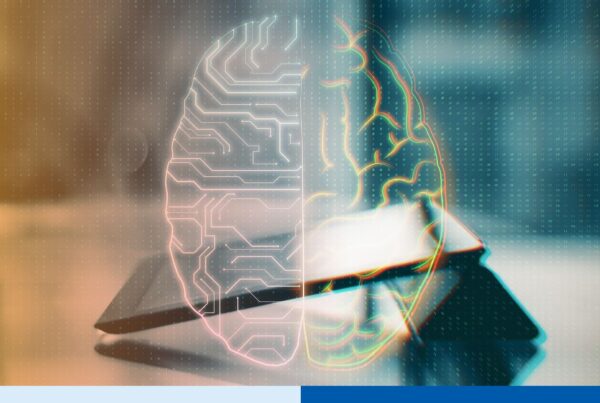 Close-up of a tablet displaying a glowing circuit-pattern brain graphic, representing digital IP and data protection