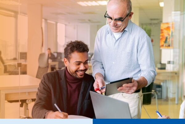 Employee shadowing an experienced mentor