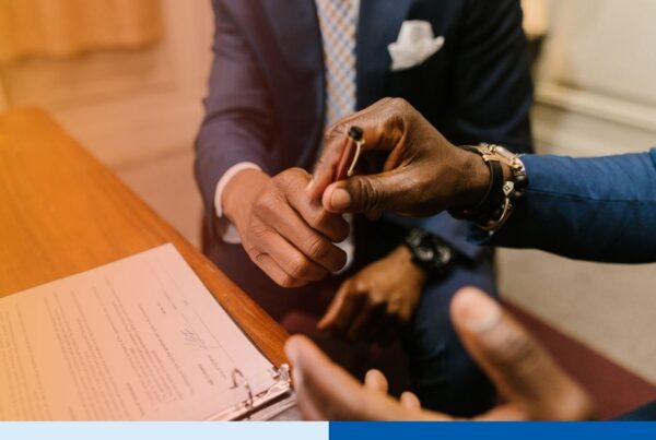 Executive reviewing offshore staffing contract terms before signing