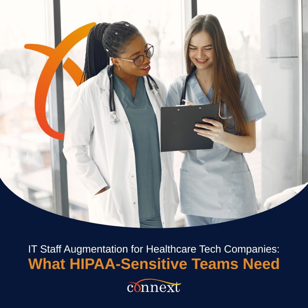 Two healthcare professionals reviewing information on a clipboard.